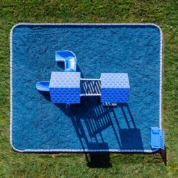 This image shows a top down shot of a blue commercial playground.