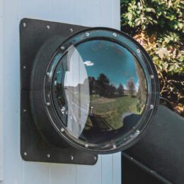 A bubble tube panel on a playhouse.