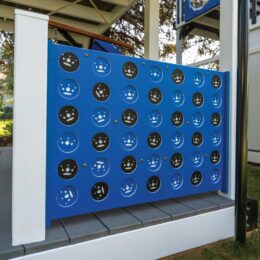 Our connect-four-in-a-row game attached to a swing set.