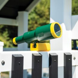 A play telescope on a vinyl commercial playground.